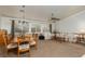 Comfortable living room with natural light, featuring plush seating and ample space for dining at 8213 Cabin Springs Ave, Las Vegas, NV 89131