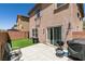 The backyard features a patio area and sliding glass doors at 8733 Autumn Teal Ave, Las Vegas, NV 89178