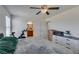 Bright bedroom featuring a large bed, dresser, and an ensuite bathroom at 8733 Autumn Teal Ave, Las Vegas, NV 89178