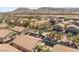 Aerial view of a townhome community with a pool and mountain views at 89 Day Trade St # 1, Henderson, NV 89074