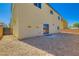 Exterior view of home with large backyard, ready for landscaping at 9722 Rocket Grove Ct, Las Vegas, NV 89178