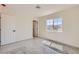 Bright bedroom with a window and doorway, perfect for a comfortable and inviting living space at 9722 Rocket Grove Ct, Las Vegas, NV 89178