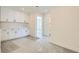 Spacious bonus room with white cabinetry and neutral carpet at 9722 Rocket Grove Ct, Las Vegas, NV 89178