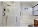 Bathroom showcasing a separate shower and soaking tub at 9864 Maspalomas St, Las Vegas, NV 89178