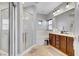Elegant bathroom with glass shower, soaking tub, and double vanity at 9864 Maspalomas St, Las Vegas, NV 89178
