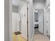 Bathroom with a shower, and a view into the bedroom from the bathroom door at 9864 Maspalomas St, Las Vegas, NV 89178