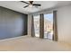 Spacious bedroom with sliding glass doors to backyard at 9864 Maspalomas St, Las Vegas, NV 89178