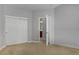 Cozy bedroom featuring a closet and a view into an en-suite bathroom at 9864 Maspalomas St, Las Vegas, NV 89178