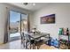 Dining area with sliding glass doors and modern furnishings at 9864 Maspalomas St, Las Vegas, NV 89178