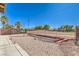 Expansive backyard featuring decorative rocks and a wrought iron fence showcasing mountain views at , Las Vegas, NV 89122