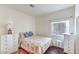 Cozy bedroom with hardwood floors and a window overlooking the yard at , Las Vegas, NV 89122