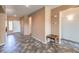Hallway featuring tiled floors and doorway to front door at , Las Vegas, NV 89122