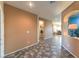 Hallway with tiled floors leading to the laundry room at , Las Vegas, NV 89122