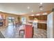 Bright kitchen with a dining area and bar seating, opening to an outdoor patio for seamless entertaining at , Las Vegas, NV 89122