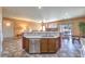 Kitchen featuring a breakfast bar, stainless steel dishwasher, and open access to the dining area at , Las Vegas, NV 89122