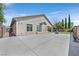 Backyard with a large concrete area, basketball hoop, and low-maintenance landscaping, great for active families at 10325 Sweet Fennel Dr, Las Vegas, NV 89135