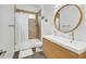 Well-lit bathroom showcasing a double sink vanity, shower with tile accents, and a functional layout at 10325 Sweet Fennel Dr, Las Vegas, NV 89135