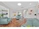 Bright living room with hardwood floors, stylish furniture, and an open floor plan at 10325 Sweet Fennel Dr, Las Vegas, NV 89135