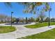 Community playground with colorful play structures, walking paths, and open green space for outdoor fun at 10325 Sweet Fennel Dr, Las Vegas, NV 89135
