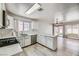 The well-equipped kitchen has white cabinets and flows into the dining area, perfect for entertaining at 1038 Silver Creek Ave, Las Vegas, NV 89183