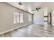 This light-filled living room offers luxury vinyl floors and a modern ceiling fan at 1038 Silver Creek Ave, Las Vegas, NV 89183