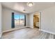 Serene primary bedroom with a bright window and ensuite bath at 1038 Silver Creek Ave, Las Vegas, NV 89183