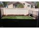 Fenced backyard with artificial grass at 1081 Elation Ln # 2, Henderson, NV 89002