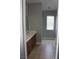 Bathroom featuring tiled floors, a modern vanity, and a window for natural light at 1081 Elation Ln # 2, Henderson, NV 89002