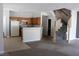 Open-concept layout showcasing the kitchen and staircase at 1081 Elation Ln # 2, Henderson, NV 89002