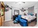 Cozy bedroom featuring bright decor, soft carpet, and ample natural light at 10918 Avenzano St, Las Vegas, NV 89141