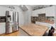 Modern kitchen featuring stainless steel appliances, granite countertops, and a center island at 10918 Avenzano St, Las Vegas, NV 89141