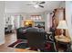 Cozy living room featuring a fireplace, plush seating, and stylish decor with lots of light at 10918 Avenzano St, Las Vegas, NV 89141