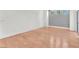 Open living room with hardwood floors and natural light at 10955 Sospel Pl, Las Vegas, NV 89141