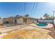 Backyard featuring a pool, patio, and fenced perimeter at 1108 Princess Katy Ave, Las Vegas, NV 89119