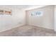 Simple bedroom with carpeted floors and a window allowing for natural light at 1108 Princess Katy Ave, Las Vegas, NV 89119