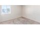 Bedroom featuring carpet floors and a window allowing for natural light at 1108 Princess Katy Ave, Las Vegas, NV 89119