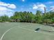 Full-sized community basketball court ready for a pick up game with neighbors at 11139 Zarod Rd, Las Vegas, NV 89135