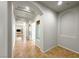 Bright hallway with tiled flooring, arched doorways, and natural light streaming throughout at 11139 Zarod Rd, Las Vegas, NV 89135