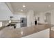 Kitchen with stone countertops, stainless steel appliances and breakfast bar at 11139 Zarod Rd, Las Vegas, NV 89135