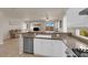 Open kitchen with granite countertops view into the living room at 11139 Zarod Rd, Las Vegas, NV 89135