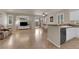 Spacious living room featuring tile floors, ample natural light, and a seamless open-concept layout at 11139 Zarod Rd, Las Vegas, NV 89135