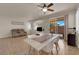 Open-concept living room with tile floors that connect with the outdoor area, enhancing the space at 11139 Zarod Rd, Las Vegas, NV 89135
