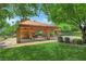 Outdoor pavilion with brick columns, picnic tables, and landscaped surroundings, perfect for community gatherings at 11139 Zarod Rd, Las Vegas, NV 89135