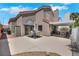 Spacious backyard featuring ample seating area, table and mature landscaping at 124 Wynntry Dr, Henderson, NV 89074