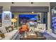 Cozy living room with comfortable seating, outdoor lounge, and a mountain view at 12544 Claymore Highland Ave, Las Vegas, NV 89138