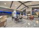 Open-concept living space flows seamlessly to the outdoor patio with pool, ideal for entertaining at 12544 Claymore Highland Ave, Las Vegas, NV 89138