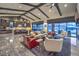 Open concept living area with vaulted ceilings and seamless flow to the backyard and pool at 12544 Claymore Highland Ave, Las Vegas, NV 89138