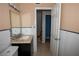 Bright bathroom features a marble vanity and decorative mosaic tile backsplash at 1340 Lucky St, Las Vegas, NV 89104