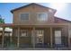 Charming two-story home with a covered patio and fenced area, offering privacy and outdoor enjoyment at 1340 Lucky St, Las Vegas, NV 89104