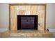 Close up of the decorative fireplace with a unique stone surround and hearth, a focal point in the living room at 1340 Lucky St, Las Vegas, NV 89104